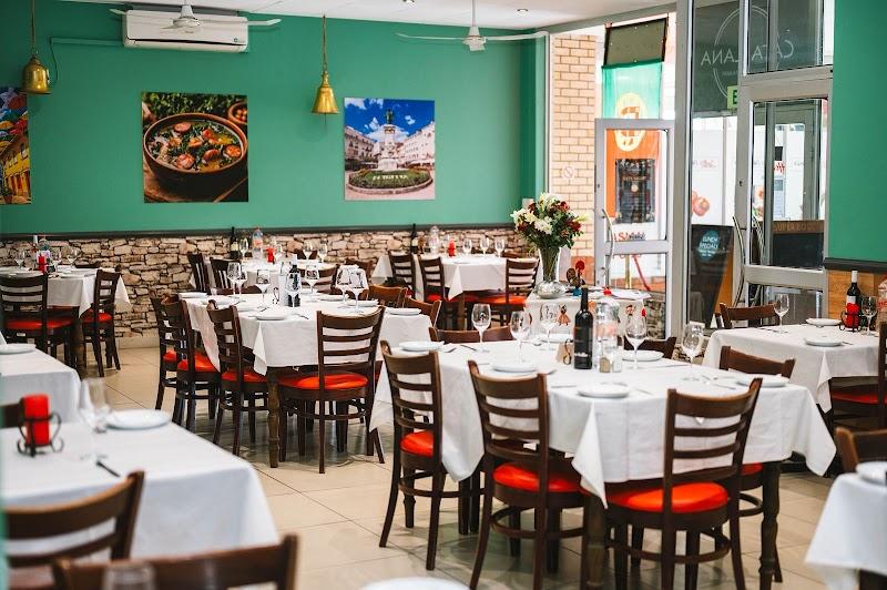 The bright green dining room at Cataplana Portuguese Restaurant